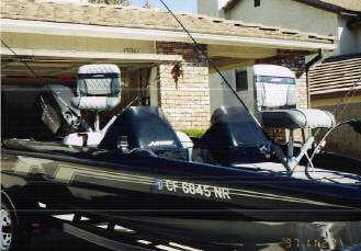 Pole holders mounted on Louie's bass boat